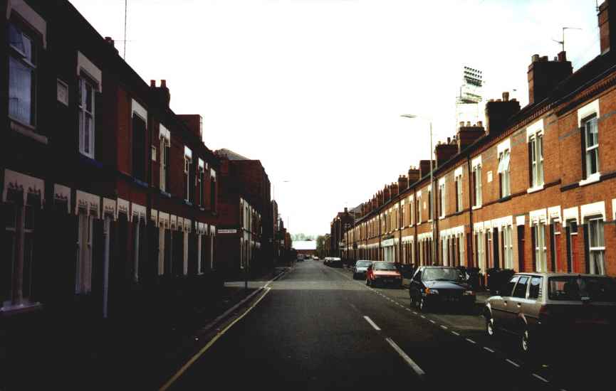 Looking along Burnmoor St.  26a is halfway down, on left.  Note football stadium lights, top right.